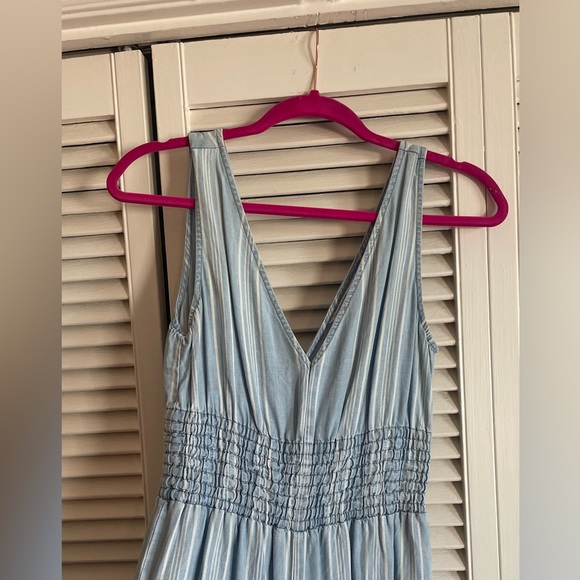 Blue jumpsuit with ruffles and white stripes - Picture 2 of 3